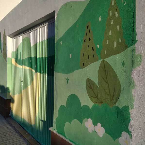 Exterior sobre puerta y muro con detalles paisagisticos